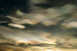 Nacreous Mother of Pearl clouds seen over Ross Island in late winter, early spring, Antarctica