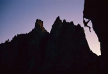 Climber silhouetted on Chain Reaction, Smith Rocks, Oregon