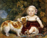 A Young Child With a Spaniel